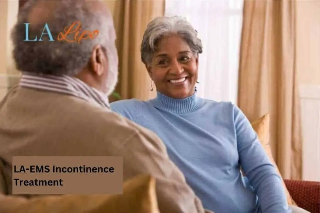 Couple sat smiling at each other - LA-EMS treatment Redhill