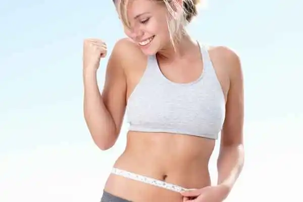 woman happy after fat reduction treatment Redhill
