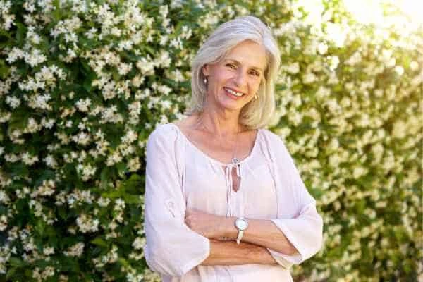 Older woman happy with urinary incontinence treatment Redhill